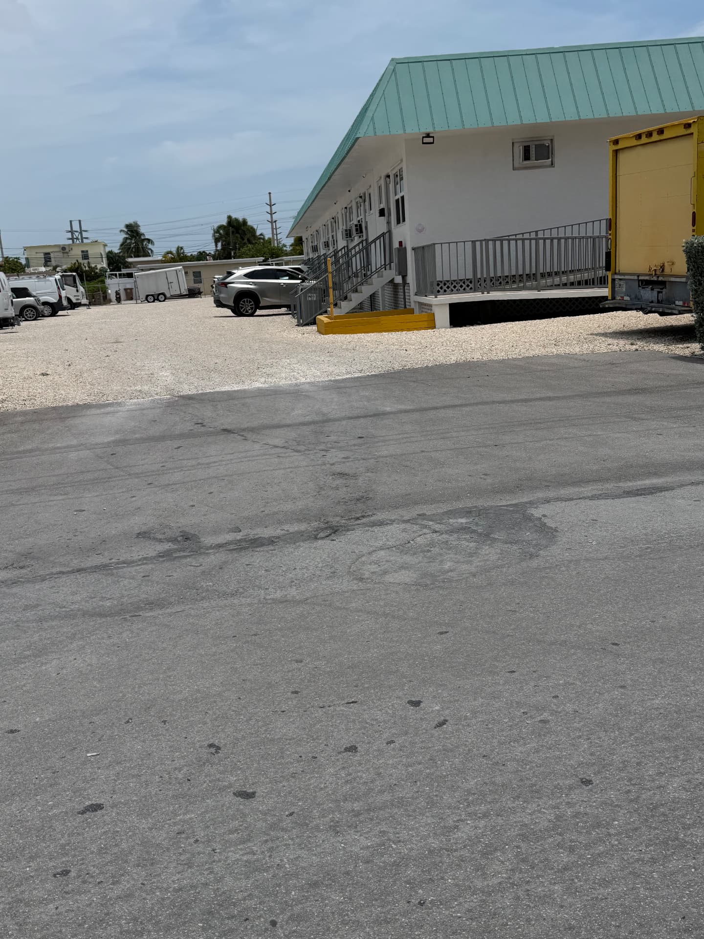 Apartment & Commercial Complex Maintenance — Commercial complex building access and gravel lot