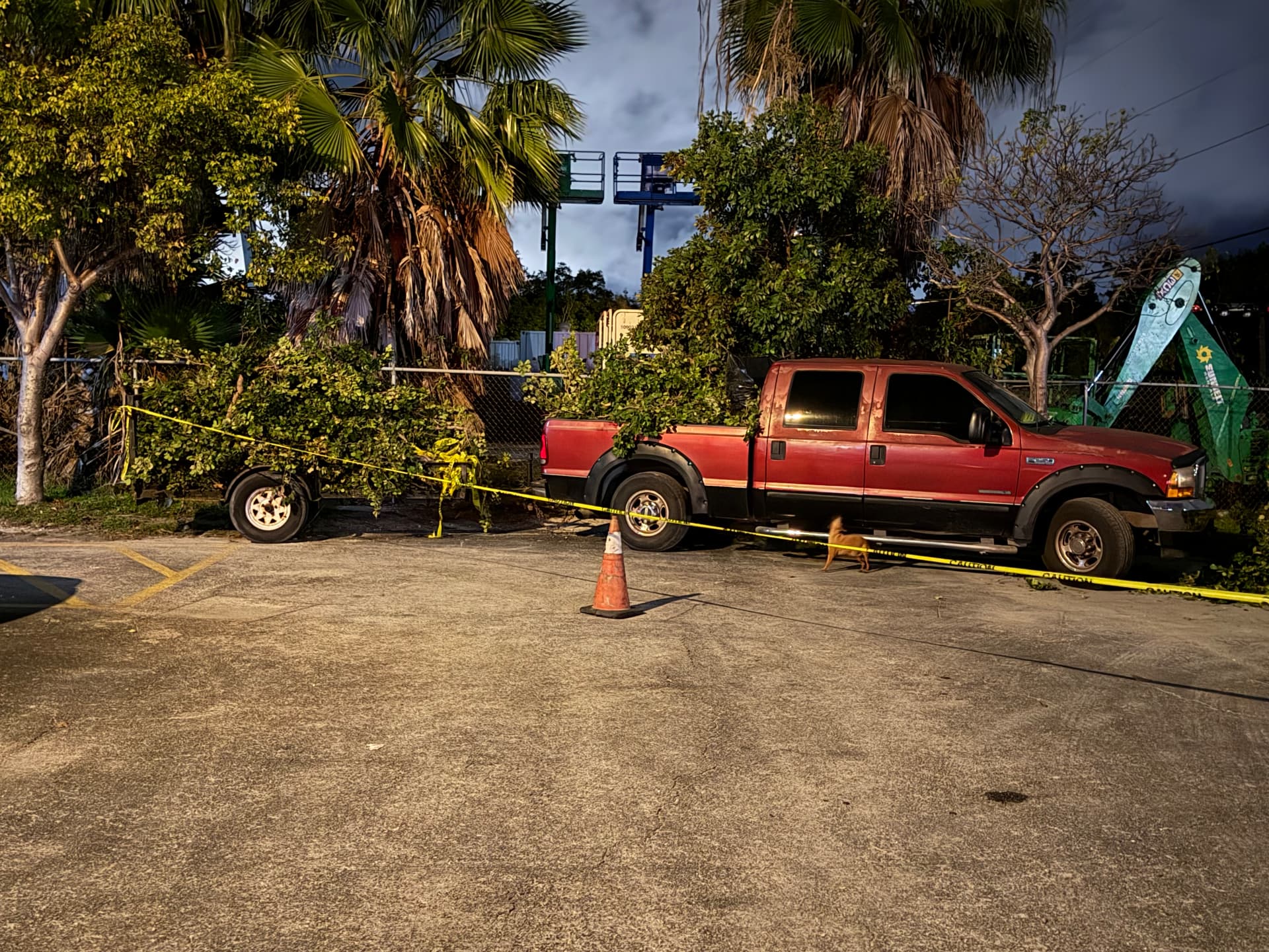 Storm Cleanup — H&D truck hauling cleared branches